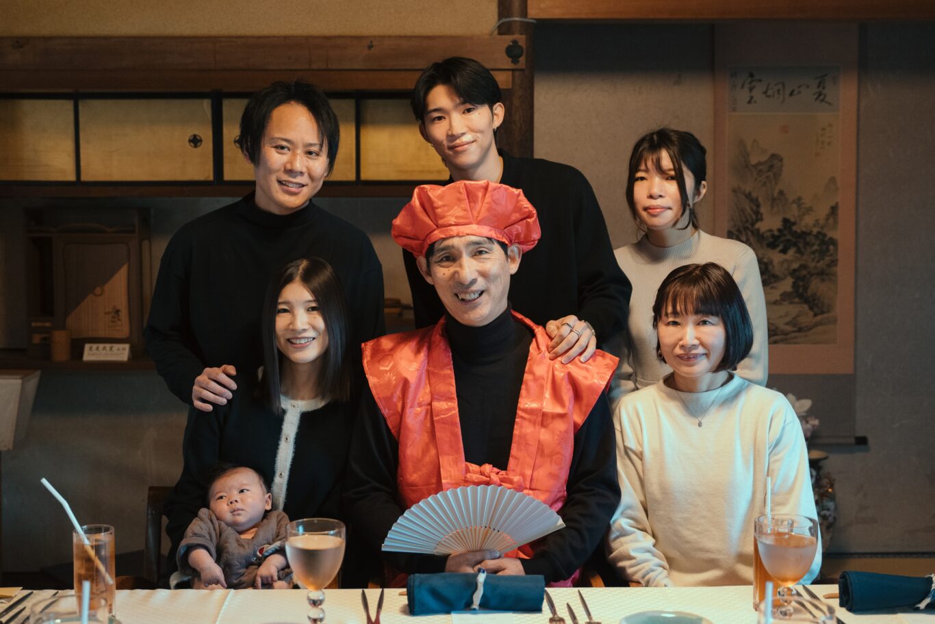 還暦に集う笑み